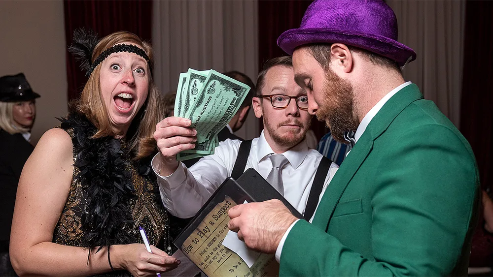 Guests enjoying a Philadelphia murder mystery party
